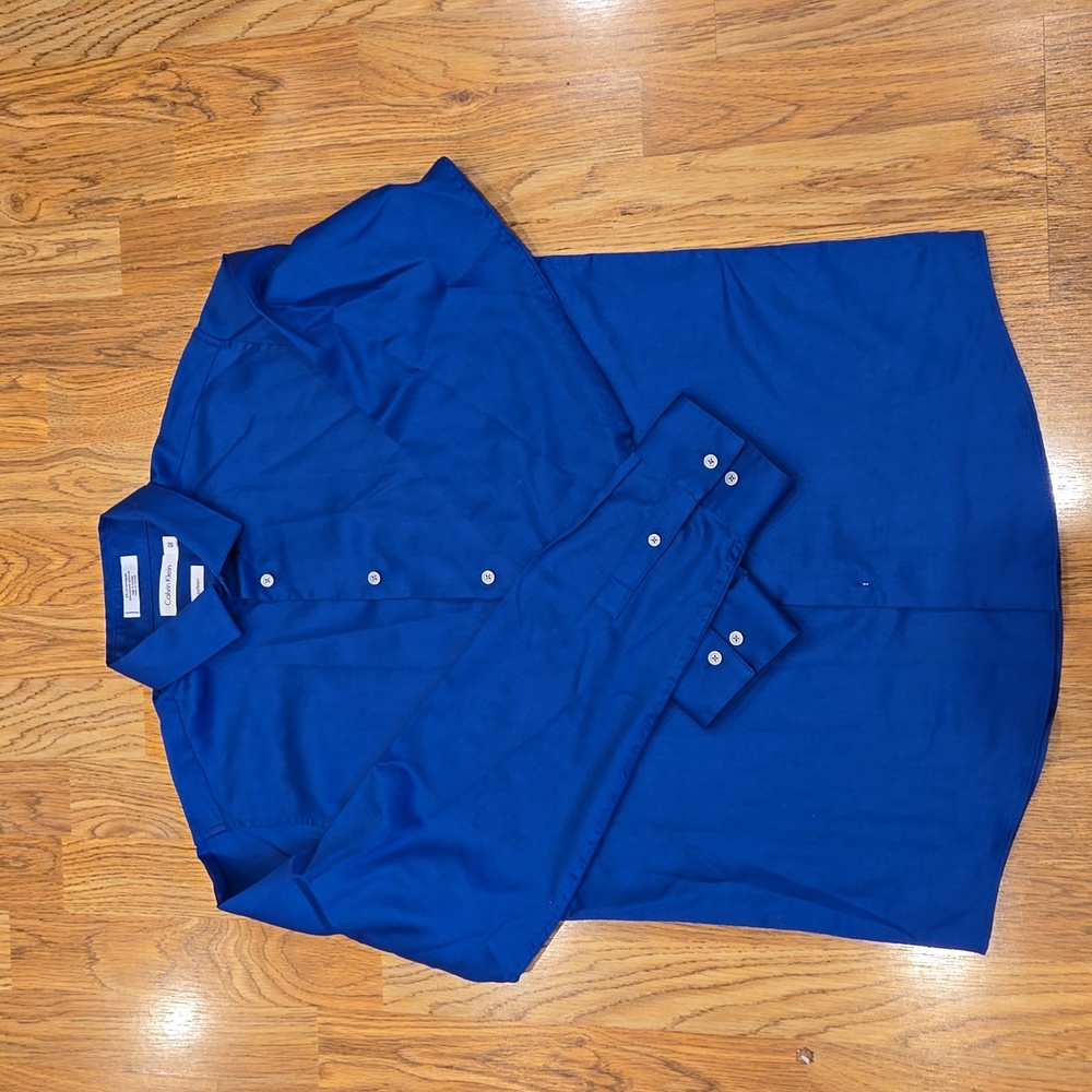 Worn once, boys size 20, royal blue Calvin Klein dress shirt